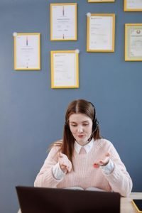 Picture of woman with many certifications