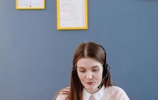 Picture of woman with many certifications
